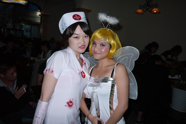 dressed up in a nurse and fairy costume for Halloween in Changsha, China