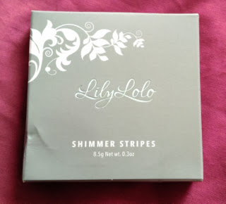 A picture of the box of Lily Lolo Shimmer Stripes in Honey Glow 