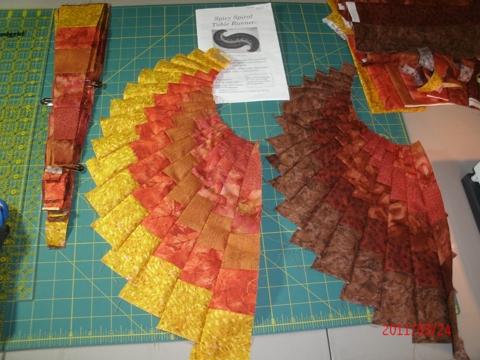 the-magic-of-quilting-start-of-the-spicy-spiral-table-runner