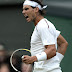 Spain's Rafael Nadal reacts during his second round men's singles match against Czech Republic's Lukas Rosol on day four of the 2012 Wimbledon Championships tennis tournament at the All England Tennis Club in Wimbledon, southwest London, on June 28, 2012. AFP PHOTO / MIGUEL MEDINA  RESTRICTED TO EDITORIAL USE        (Photo credit should read MIGUEL MEDINA/AFP/GettyImages)