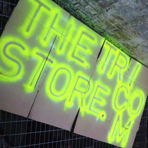 The Tri Store logo