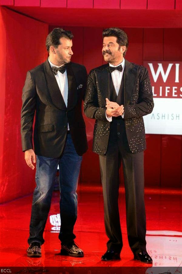 Anil Kapoor and designer Ashish N Soni walk the ramp during the grand finale of the Wills Lifestyle India Fashion Week (WIFW) Spring/Summer 2014, held in Delhi.(Pic: Viral Bhayani)