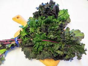 Kale. Recipe for Four Greens with Garlic Saute with mustard greens, kale, turnip or dandelion greens, and swiss chard.