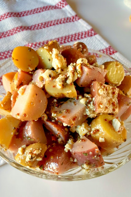 This Red White and Blue Cheese Potato Salad is a French style spin on a summer picnic favorite that your guests will love!
