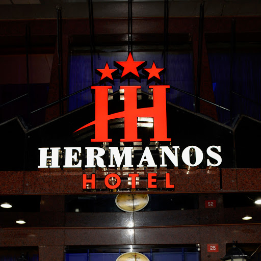 Hermanos Hotel logo