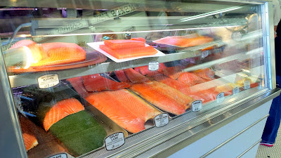 Russ & Daughters The patient, friendly, sweet gentleman behind the counter and I talked for a while, comparing the textures and flavors of the various available smoked salmons as I have never before had the fortune to get to select from amongst Gaspe Nova, Scottish, or Irish Smoked Salmon; Norwegian Smoked Salmon; Belly Lox, GravLox or Pastrami cured salmon; loin cut smoked salmon; Wild Western Nova or New Zealand King Salmon.