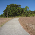 Open grasslands next to a path in Green Point Reserve (402910)