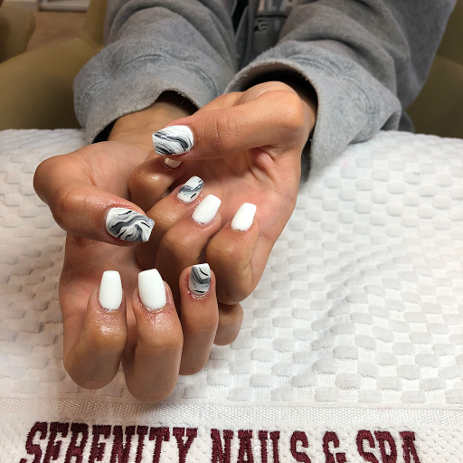 Serenity Nails & Spa logo