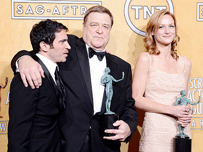 Actors Chris Messina, John Goodman and Kerry Bishe, winners of Outstanding  Performance by a Cast in a Motion Picture for 'Argo,' pose in the press room during the 19th Annual Screen Actors Guild Awards, held at The Shrine Auditorium in Los Angeles on January 27, 2013. (Getty Images)
