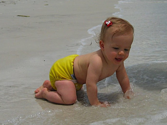 fuzzibunz baby on the beach