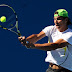 MELBOURNE, AUSTRALIA - JANUARY 24:  Rafael Nadal of Spain plays a backhand in his training session ahead of his quarter final match against Tomas Berdych of the Czech Republiuc during day nine of the 2012 Australian Open at Melbourne Park on January 24, 2012 in Melbourne, Australia.  (Photo by Quinn Rooney/Getty Images)
