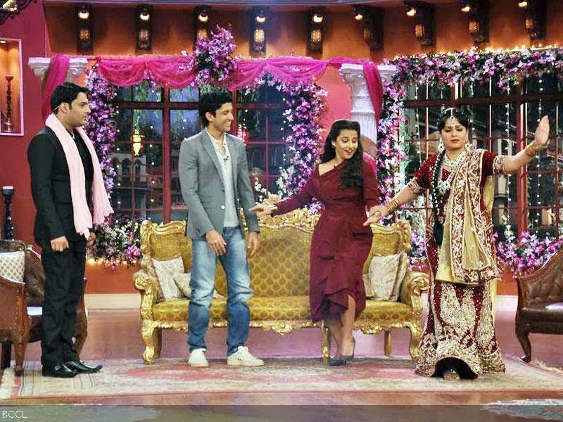 Farhan Akhtar and Vidya Balan dance with Bua played by Upasana Singh while Kapil looks on during the promotion of the movie Shaadi Ke Side Effects, on the sets of the TV show Comedy Nights With Kapil. (Pic: Viral Bhayani)