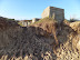 The old anti tank defences looking precarious on top of the dunes