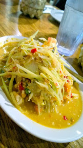 Som Dum or Som Tum Thai, a green papaya salad with peanuts and dried shrimps, both spicy and slightly sweet from Isaan Station in LA