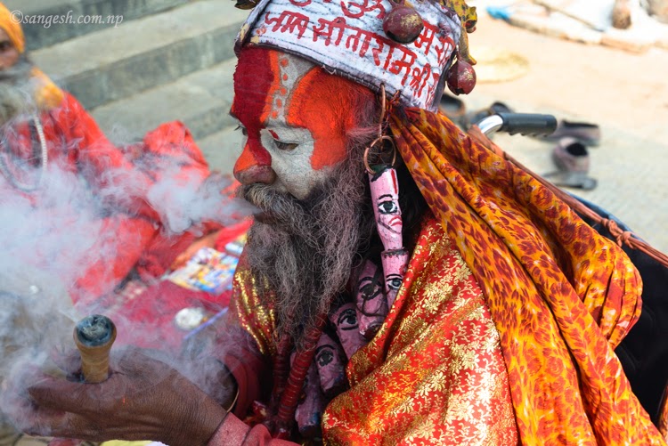 A colorful sadhu with Ganja pot
