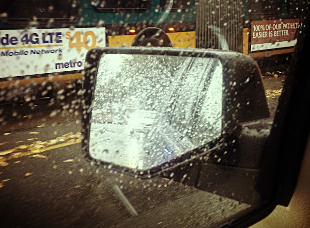 Seattle rainy afternoon looking in the rear view mirror.