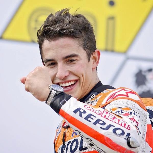 Honda rider Marc Marquez of Spain celebrates on the podium after winning the MotoGP race of the Grand Prix of Germany at the Sachsenring Circuit, on July 13, 2014, in Hohenstein-Ernstthal, eastern Germany. 