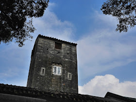 watch tower and blue sky in Shimen Village, Shaxi Town, Zhongshan