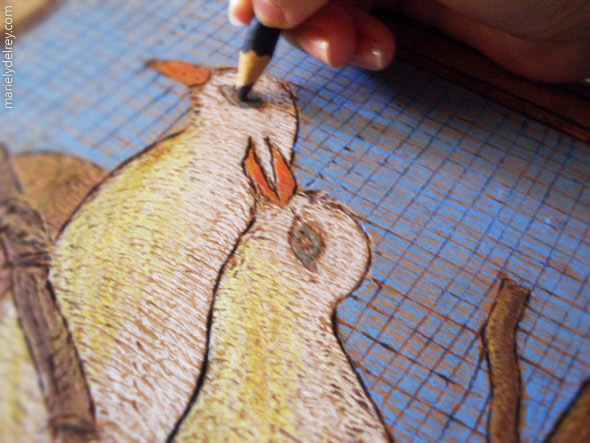 Pintura em quadro de madeira com lápis aquarelável