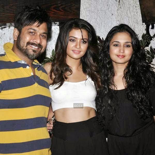 Surveen Chawla poses with her friends during the premiere of Bollywood movie Hate Story 2, held at Super Sunny Sound in Mumbai, on July 17, 2014.(Pic: Viral Bhayani)