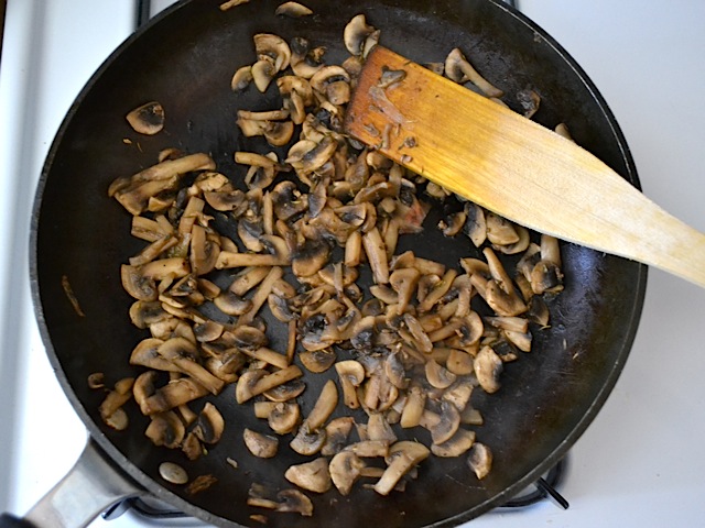 cooked mushrooms in skillet 