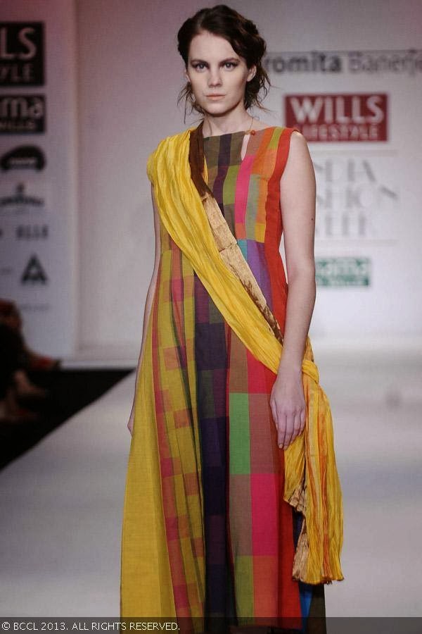 A model walks the ramp for fashion designer Paromita Banerjee on Day 2 of the Wills Lifestyle India Fashion Week (WIFW) Spring/Summer 2014, held in Delhi.