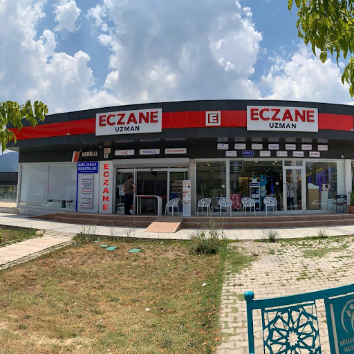 Uzman Eczanesi logo