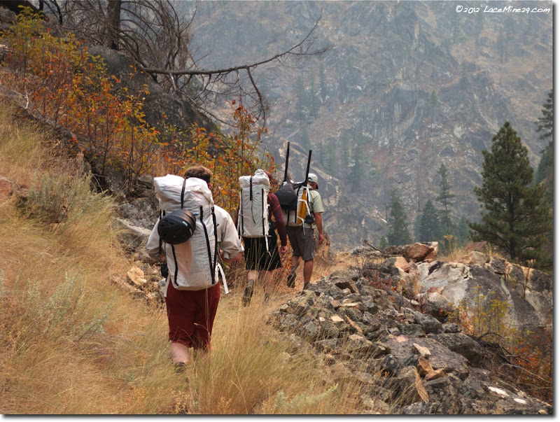 Ultralight backpackers hiking with packs