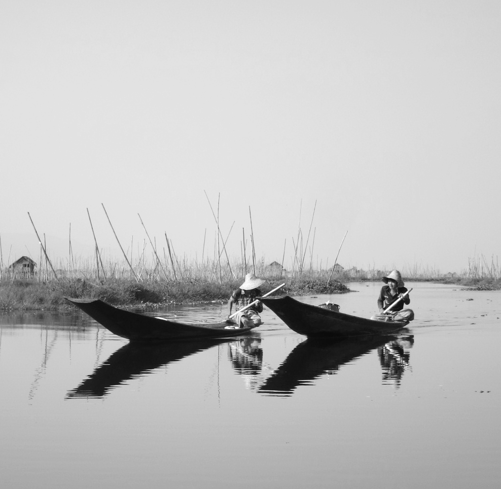 Burmese going around their business on Inle Lake, Burma
