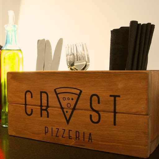Crust Pizzeria logo