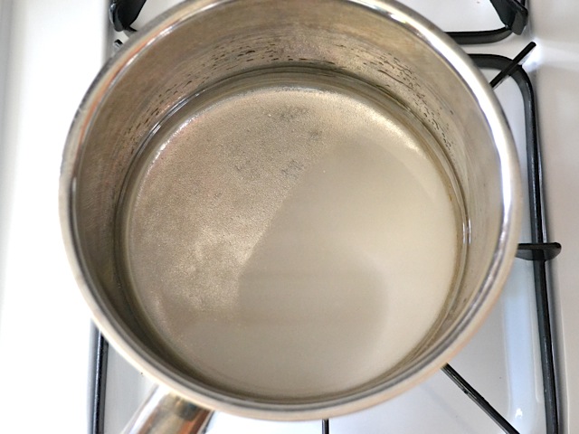 vinegar, sugar and water in pot to make pickling marinade