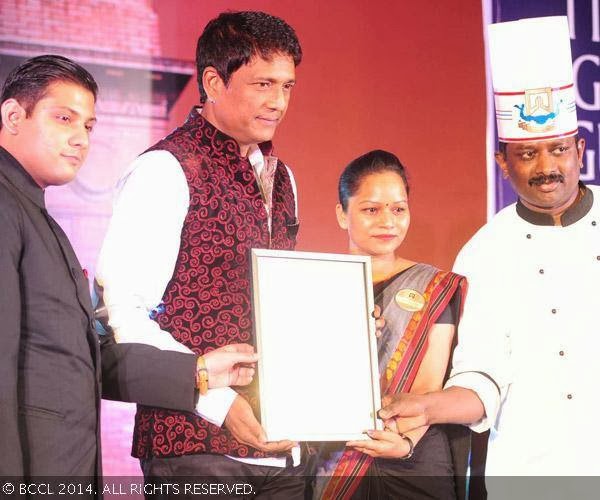 Adil Hussain gives the award to Best South Indian (Delhi) Fine Dine to Irfan Laxmidhar, Sudarshana and Chef Velu of Daskshin during Times Food Guide & Nightlife Awards, held at ITC Maurya Sheraton in New Delhi.