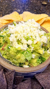 Guacamole from Food Network chefs:  The Rick Bayless Recipe- Sundried Tomato Guacamole