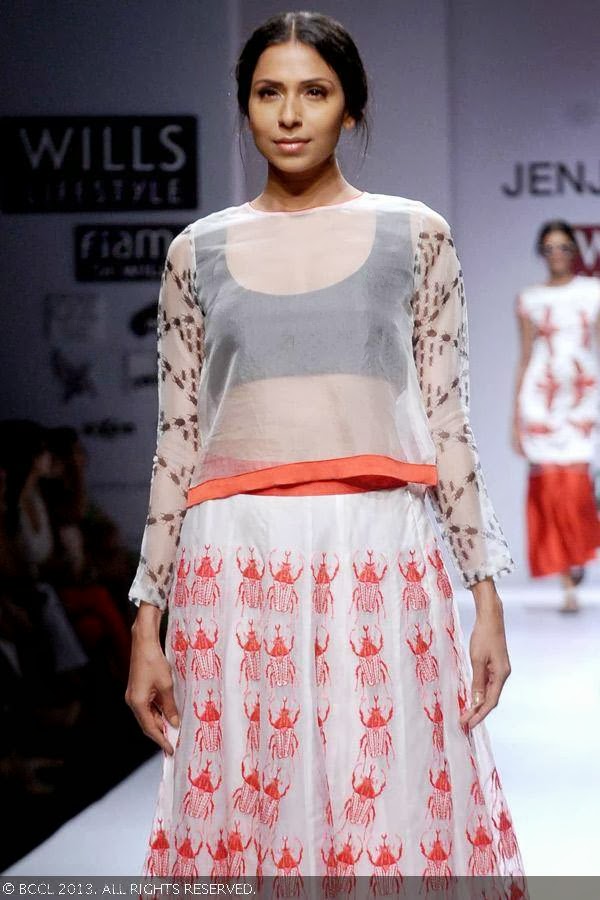 Candice Pinto walks the ramp for fashion designer Jenjum Gadi on Day 3 of the Wills Lifestyle India Fashion Week (WIFW) Spring/Summer 2014, held in Delhi.