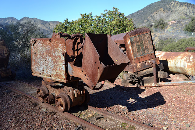 ore cart on rusting tracks