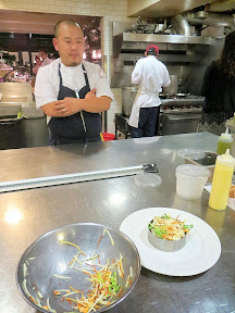 Chef Kyo Koo supervises the final plating of the salad at Blue Hour Portland