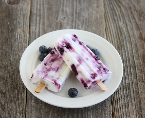 overhead photo of two Blueberry Swirl Yogurt Ice Pops