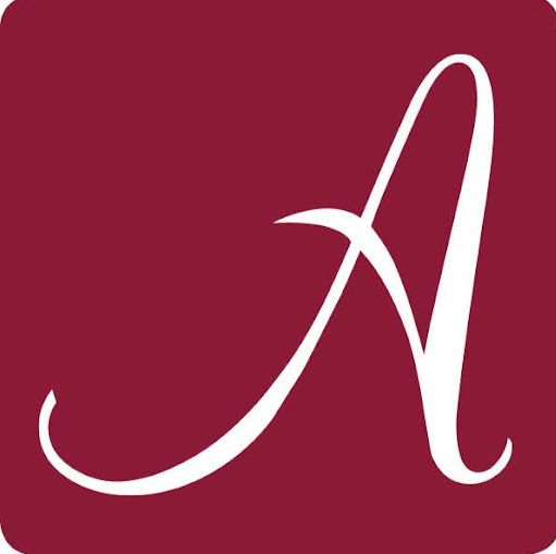 Abbey Inn & Suites logo