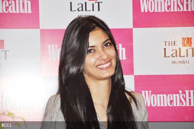 Diana Penty caught in a joyous mood during the unveiling of the latest edition of Women's Health, held at The Lalit in Mumbai.(Pic: Viral Bhayani)