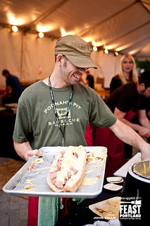 Widmer Brothers Brewing Sandwich Invitational 2012 Rodney assembling the smoked prime rib with jalapeno cheesesteak collaboration from Aaron Franklin of Austin's Franklin Barbecue and Rodney Muirhead of Portland's Podnah's Pit. Sandwich samples from Feast Portland 2012 event Sandwich Invitational. Copyright All rights reserved by Feast Portland