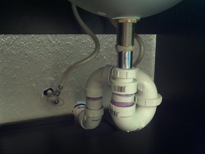 plumbing - new vanity: sink won't drain completely - home