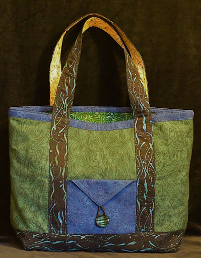 Melissa's blue and green tote bag