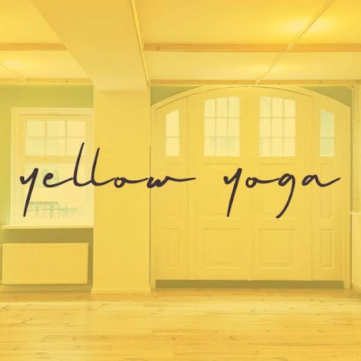 Yellow yoga logo