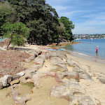 Rocky and sandy Queens Beach (254441)