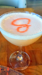 The Signature Cocktail at Giada is the G with Kappa Pisco, pineapple simple syrup, fresh lime, homemade apricot preserves, egg white and Angostura bitters