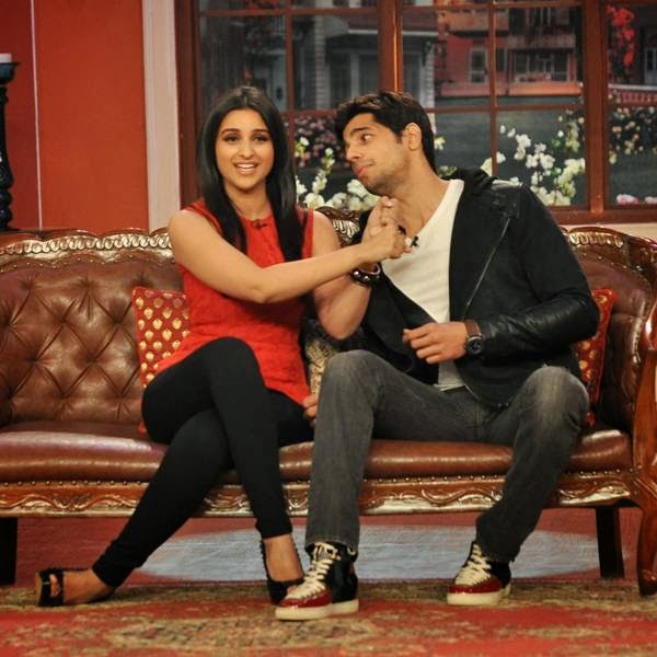 Parineeti Chopra and Sidharth Malhotra share sweet nothings during the promotion of the movie Hasee Toh Phasee, on the sets of the TV show Comedy Nights With Kapil. (Pic: Viral Bhayani)