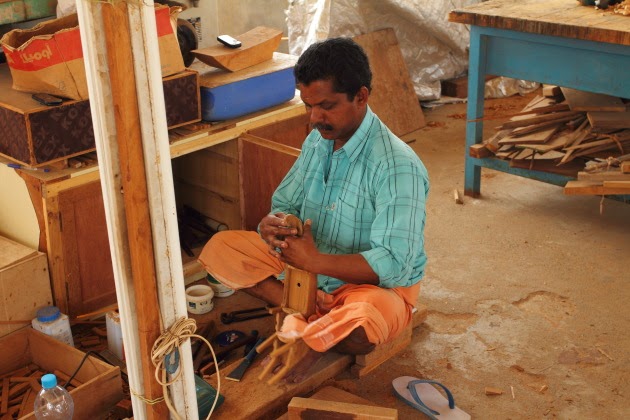 Indian artisans carvings souvenir ships at Sur, Oman