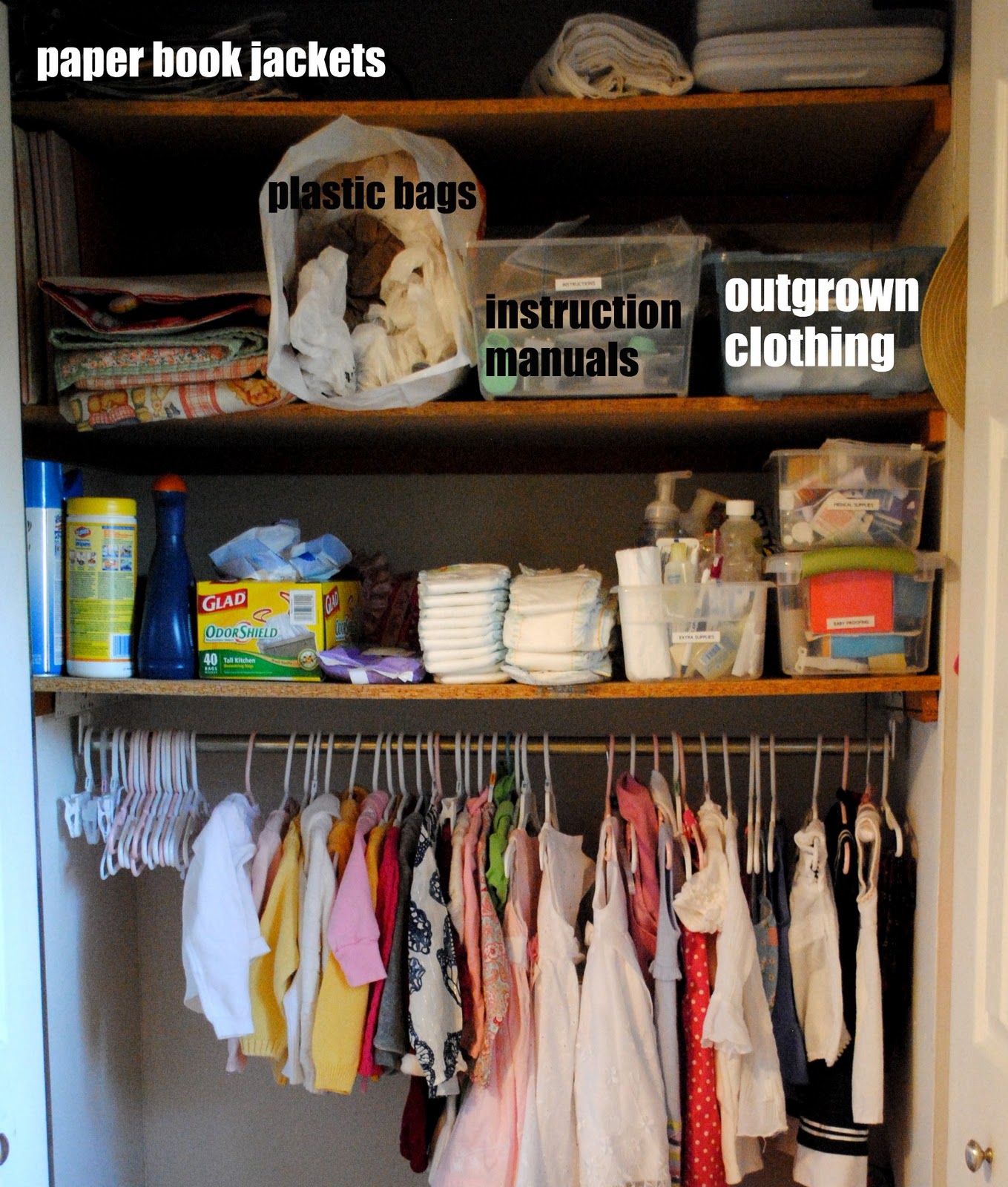 Using baby clothes hangers to organise a baby wardrobe