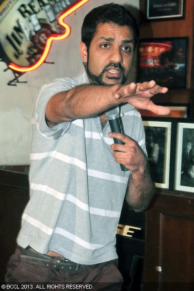 Micky Sharma makes a point during a comedy gig at Cafe Morrison, New Delhi.