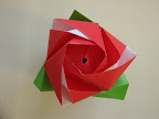 Magic Rose Cube by Valerie Vann: http://www.youtube.com/watch?v=E2Yr_SIXkVo&feature=related PDFs: http://www.scribd.com/doc/501531/Magic-Rose-Cube-1 http://www.scribd.com/doc/501533/Magic-Rose-Cube-2 http://www.scribd.com/doc/501530/Magic-Rose-Cube-3
